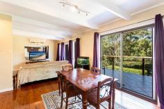 24 Barina Ave Kilaben Bay NSW 2283 Offers Over $380k Lazy Mornings Down the inviting path, set amongst manicured hedges and landscaped gardens this cottage is right at home overlooking the bushland reserve from the living areas and outdoor entertaining deck. The open plan lounge & dining areas are air-conditioned and also have the summer breeze from the north-east aspect sailing through. On the lower level, the main bedroom & ensuite and 3rd bedroom open on to the paved outdoor area, perfect for a private Saturday morning breakfast. The backyard provides a small level grassed space for kids and their toys, just 1.6km to Toronto CBD. View the virtual tour for a complete walk through of the home Inspection Times Please Contact Office Land Size 601 m2