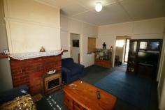 43 Cox Street Mudgee NSW 2850 $249,000 Situated only two blocks to the Mudgee CBD is this two bedroom plus sunroom home. Located on a corner block of 1,189 sm approx. The home presents in original condition and lends itself to renovators and first home buyers. The clad home has two bedrooms at one end adjoining a living area that contains a wood fire. There is an eat in kitchen that is of good size and the bathroom, laundry and w/c are all separate. The rear sunroom has a lovely North/Easterly aspect and opens onto the secure rear yard. The property has off street parking for two vehicles and plenty of space for the kids and pets. The property is accessed via two wide street frontages which gives the feeling of not being hemmed in. An easy walk to town to enjoy the cafes and resturants of Mudgee and easy access to schools and amentities. Property Details Bedrooms 2 Bathrooms 1 Garages 2