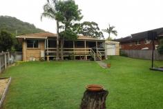 45 Koonwarra St West Haven NSW 2443 $349,000 Brick & Tile Under $350k House - Property ID: 784194 Neat three bedroom home in popular Waterveiw Heights Estate nestled at the base of North Brother Mountain. Brick and tile construction with separate lounge on entry, dining off kitchen, built-in robe in master bedroom & full length rear deck overlooking the large, fenced back yard. The property backs onto public reserve and has a single, drive through garage plus an extra detached garage & carport at rear. All in all a neat home in a lovely estate and in a price range that wont break the bank. Print Brochure Email Alerts Features Land Size Approx. - 669.5 m2