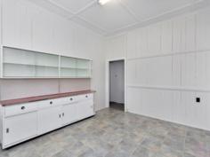 9 Cothill Rd Booval QLD 4304 $329,000 Stunning Bungalow and a Shed A gorgeous Californian Bungalow situated within walking distance to train station, Booval Fair shopping centre and Sacred Heart School. The character and charm is endless in this 1940′s Bungalow with high ceilings, antique light shades and beautiful molded ceilings. French doors with lead light glass separate the lounge and dining rooms and adjacent is the freshly painted kitchen with retro cupboards – it’s like taking a step back in time to the elegance of yesteryear. The perfect home for the First Home Buyer, Investor or Retiree. There are 2 huge bedrooms, the main with bay window and window seat and each bedroom has access to a long sleep-out – perfect to use as a third bedroom, a child’s playroom, study or a sitting room. As well as having a powered lock-up double shed, there is also a double carport and when not is use for car cover, it becomes a spacious outdoor entertainment area for family get-togethers or barbecues. The fully fenced property is on 966 square metres and situated in a quiet street. A light and airy house just waiting for your to make it your home