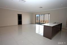 1/7 Burrundulla Road Bourkelands NSW 2650 $379,000 Luxury unit Villa - Property ID: 496546 First impressions do count... Designed for the busy lifestyle these low maintenance luxury executive units both incorporate four bedrooms into a quality filled floor plan that will definitely capture your attention. - Presenting four bedrooms, three bedrooms with built-in robes and a large master with walk-in robe and ensuite - A spacious kitchen features an abundance of storage, Caesar stone bench tops, walk-in pantry and a 900mm stainless steel Omega oven/gas cooktop - Open plan living incorporates the kitchen, meals and living area flowing through to the outdoor entertaining area - The main bathroom contains a bath, shower, vanity and toilet with floor to ceiling tiles - Features that make a difference include nine foot ceilings, large polished porcelain tiles, down lights throughout and heating/cooling - A single lock-up garage with internal access and a low maintenance rear yard make living simple Print Brochure Video Email Alerts Features Large open plan living Quality kitchen Low maintenance Porcelian polished tiles Ensuite to master Stainless steel Omega oven