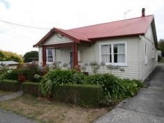 14 David St Smithton TAS 7330 $170,000 Retire to the Garden A beautiful smaller home with colourful cottage garden. Ideal for the retired couple with green thumbs or those who just love pottering around outdoors. The home consists of two bedrooms - one of which is large enough to accommodate two doubles! The living areas consist of a sunroom on the northern entrance, a central kitchen/dining room then a formal loungeroom. The bathroom has recently been updated to suit someone with limited mobility with safety rails, etc. David Street is one of the quietest streets in the town yet just around the corner and a short stroll to the main street for shopping. Whether you are a young couple starting out or someone retiring we're sure you'll appreciate the location. Property Amenities & FeaturesGeneral: Reference: RYTNN4 Property Type: Residential Category: House Land Area: 752m² Bedrooms: 2 Bathrooms: 1 Parking: 1 Features: n/a, n/a