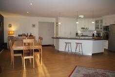 6 Ott St Millmerran QLD 4357 $369,000 Residential Bedrooms: 4 Bathrooms: 2 Garage Spaces: 4 6 Ott St Millmerran – Class & Charm – Beautifully Presented – Established Gardens – $369 000 Area: 1000 Square metres – 4 b/r brick home, all b/rs have split system a/c & built-in cupboards, main with w.i.r. & ensuite, a feature of the home is the large open plan living area, combining the kitchen, with dishwasher, gas cooktop, electric oven, large pantry, display cupboard, r/c air-conditioner, bathroom with shower & bath, laundry with built-in storage & broom cupboard, storage room, double garage on house.Large under cover outdoor living area café blinds, 9m x 6m shed 2 car access, rainwater tank connected to shed for garden, 33000 lt tank connected to house. Established landscaped gardens, including an enclosed court yard area on the Southern side. Fenced on 2 sides. This well established home is in an ideal location, close to the school & sports centre and is ready for the new owner to move in.
