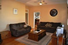 178 Mayne St Gulgong NSW 2852 $375,000 HIDING BEHIND THE TREES This quintessential family home offers an array of spectacular spaces both inside and out. The double brick rendered home is made up of 3 large bedrooms all with built in robes and ceiling fans the master also with air conditioning. The light filled country kitchen has plenty of cupboard space and offers both dine in and alfresco dining through the French doors on to the private leafy patio. The spacious living room has a real feeling of warmth and is a central hub of this family home, a formal living room or games / kids living room is adjoining. Linked to the main house via a sun room is a neat and tidy fully self contained one bedroom granny flat with air conditioning and its own separate power meter. Boasting a 1721m2 fully fenced corner block and backing on to the Gulgong golf course gives you a real feeling of space and privacy as you only have one neighbouring property. Possible subdivision opportunity also exist subject to council approval. The established Australian native garden surrounds the home to create your own private sanctuary with multiple outdoor entertaining areas. The car is not forgotten here with a double garage and workshop plus two carports. All in all a very well presented property with lots to offer. Inspection Times Contact agent for details Features Entertaining Area Established Gardens Rear Lane Access Built In Robes Floorboards Fully Fenced Open Fireplace Outdoor Entertaining Rumpus Room Secure Parking Shed Water Tank Workshop Land Size 1721 m2