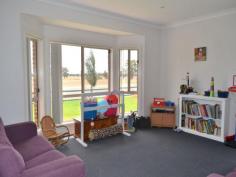 4 Kurrawong Street Temora NSW 2666 $480,000 Brick & 5 Acres Who wants the headache of Building? Call and make appointment today to view this lovely family home, which offers a warm cosy secluded atmosphere. The big plus is the 4 large bedrooms all with BIRs and carpeted. Main bedroom features ceiling fan and ensuite. Kitchen has plenty of cupboard space, pantry, dishwasher and stainless steel appliances- very nice! Laundry tiled with cupboards and folding table. The open plan dining/ lounge room and a bonus of a secluded parents retreat, gives you two family rooms, all rooms have large windows allowing for lots of light. Double garage with storage along on side means less clutter! Workshop with large tank for the garden & lawn. Paved undercover BBQ area. Huge enclosed yard with cubby house for littlies. Must be seen to be appreciated Vendors realistic For Sale $480,000 Features General Features Property Type: House Bedrooms: 4 Bathrooms: 2 Land Size: 2.02ha (5.00 acres) (approx) Indoor Built in Wardrobes Dishwasher Ducted Heating Ducted Cooling Outdoor Remote Garage Secure Parking Garage Spaces: 4 Outdoor Entertaining Area Shed Fully Fenced Eco-friendly Water Tank Inspections Inspections by appointment only