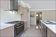 Lot 15 Lewis Jones Drive Kellyville NSW 2155 PriceOffers over $1.15 mil Don't miss this opportunity to join one of Sydney's fastest growing communities and live in this wonderful brand new single level home in Kellyville. It is located on a quiet street within only few minutes walking distance to the public transport. Large sized bedrooms - master bedroom with ensuite and other 3 bedrooms have built-ins. * Brand new home just completed * 4 Bedrooms plus a Media Room * Land size 740 m2 * Triple Garages - remote controlled * Block out blinds in all windows * Zoned Reverse Cycle Ducted Air Conditioning * Drinking Water Filter System * 900mm Gas cooktop and electric oven * Gas point in family * Pheem Continuing Hot Water System * Hot Water temperature control panel in the ensuite * Security alarm system * Enviropest Termite Barrier Protection System * Recycled water tank - 10,000 litres * Space in back garden for a Granny Flat - Subject to council approval * 5 mins WALKING distance to proposed Kellyville Railway Station * 5 mins to Rouse Hill Town Centre * 10 mins to Castle Hill Home Maker Centre * 15 mins to Castle Towers Shopping Centre * More and more... Open for Inspection: 12:00pm - 12:30pm on Saturday Address: Lot 15 Lewis Jones Drive Kellyville (Corner of Gainsford Drive) Property Features Property ID 12532333 Bedrooms 4 Main with ensuite and others with built-in Bathrooms 2 Garage 3 Land Size 740 Square Mtr approx. Air Conditioning Yes Alarm System Yes Built In Robes Yes Ducted Cooling Yes Ducted Heating Yes Fully Fenced Yes Remote Garage Yes Rumpus Room Yes