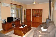 178 Mayne St Gulgong NSW 2852 $375,000 HIDING BEHIND THE TREES This quintessential family home offers an array of spectacular spaces both inside and out. The double brick rendered home is made up of 3 large bedrooms all with built in robes and ceiling fans the master also with air conditioning. The light filled country kitchen has plenty of cupboard space and offers both dine in and alfresco dining through the French doors on to the private leafy patio. The spacious living room has a real feeling of warmth and is a central hub of this family home, a formal living room or games / kids living room is adjoining. Linked to the main house via a sun room is a neat and tidy fully self contained one bedroom granny flat with air conditioning and its own separate power meter. Boasting a 1721m2 fully fenced corner block and backing on to the Gulgong golf course gives you a real feeling of space and privacy as you only have one neighbouring property. Possible subdivision opportunity also exist subject to council approval. The established Australian native garden surrounds the home to create your own private sanctuary with multiple outdoor entertaining areas. The car is not forgotten here with a double garage and workshop plus two carports. All in all a very well presented property with lots to offer. Inspection Times Contact agent for details Features Entertaining Area Established Gardens Rear Lane Access Built In Robes Floorboards Fully Fenced Open Fireplace Outdoor Entertaining Rumpus Room Secure Parking Shed Water Tank Workshop Land Size 1721 m2