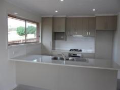 1/232 Vickers Rd Lavington NSW 2641 For Sale $295,000 * Under construction, modern & smart design home with ultra modern colour scheme & decor. * Offering a formal lounge, open plan family/dining area, a designer kitchen with quality appliances including dishwasher, tiled floors and ample cupboards and pot-draws. * 3 generous bedrooms with built-in robes, master bedroom with a large en-suite and ducted heating and cooling throughout. * Fully landscaped low maintenance yard, undercover rear entertainment plus secure fencing and rainwater tank. * Double garage with remote and internal access. This property offers comfortable and easy modern living at every turn. * Separate Community Torrens Title and only two on the block, suitable for young executives, investors or retirees, close to all amenities and transport. Take advantage of this opportunity to secure a new property and save on stamp duty-off the plan and take advantage of government grants on new home purchases. When you combine comfort, style, quality and location you get perfection! Features General Features Property Type: Townhouse Bedrooms: 3 Bathrooms: 2 Outdoor Garage Spaces: 2