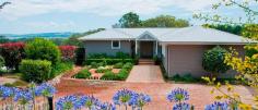 22 Hoddle St Burrawang NSW 2577 $1,225,000 RURAL SOPHISTICATION IN HISTORIC BURRAWANG Situated proudly on the triple-A front row at one of Burrawang's most select addresses, the 'Longacre' homestead sits quietly in a private, set-back position, enjoying a unique 180-degree vista with serene, panoramic northern views of farmland, over lush Highland green hills to the Wingecarribee river. With its immaculate weatherboard exterior and metal roof, this sophisticated home encapsulates the essence of country life and offers the best of all worlds; privacy, location, convenience, style, space and sun. Enter through a wide double door to an elegant, spacious foyer, leading to a sun-filled lounge with wood burning fire. Opposite, the stunning, near-new white Caesarstone kitchen with walk-in pantry, island bench and Miele appliances adjoins a large country-style dining area, all framed by picture windows on three sides. Accommodation consists of three double-sized bedrooms, with ensuite off the master, loads of additional closet storage and super-size main bathroom. The home is cleverly designed to utilise brilliant northern light and sun throughout, including the rear entertaining balcony. Plantation shutters, Roman blinds, real timber floors and superior hydronic heating provide efficient interior climate control. The vast easy-care garden has a fairy-tale stream at the bottom, and there is garaging for three cars, as well as ample guest parking. An outstanding property, immaculate and ready to enjoy, in the tranquil village of Burrawang, recognised for its charming, old-world homes, lively, arts-loving community and local sociability. Just a short stroll to the famous Burrawang Village Hotel for lunch or dinner, or breakfast at the newly refurbished Burrawang General Store (open again in July) – but within an easy 15-minute drive to the full services of Bowral, or five minutes to Robertson for the supermarket, great coffee and a different vibe. Viewing by appointment. Contact: Michael at Knight Bailey 0404 111 366 Outgoings per annum: Council: $ 1,800.00 Water: $ 200.00 (plus usage)