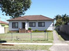20 Dargan St Yagoona NSW 2199 Fibro Cottage on 689sqm Highly set and with great potential, this three bedroom fibro home is within a short walk to school & local shops and has potential for a duplex(subject to council approval) Features include: *Separate lounge & dining room *Original bathroom with separate toilet *Updated kitchen *Side driveway to a good size backyard *External laundry *Land dimensions 16.15m x 42.67m= 689 sqm (approx) Property Snapshot Property Type: House Construction: Fibro Features: Close to schools Dining Room Lounge Polished Timber Floors
