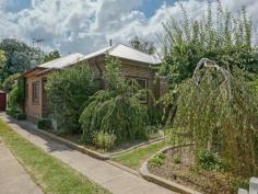 361 Lords Pl Bletchington NSW 2800 $409,000 Nestled at the top of Lords Place behind the picket fence, this home has lots to offer the double brick seeker. There are 3 large bedrooms, plus an office or 4th bedroom. The kitchen is central in the home and overlooks the lovely spacious dining area. The lounge has a cosy wood heater and opens to the covered outdoor living area and beyond to the fully enclosed yard. Sunny and warm with lots of original features including patterned ceilings, polished floorboards, claw foot bath, ducted gas heating and split system air conditioning this home should definitely be on your shopping list. Features General Features Property Type: House Bedrooms: 3 Bathrooms: 2 Land Size: 760 m? (approx) Indoor Toilets: 2 Air Conditioning Outdoor Garage Spaces: 2 Other Features Close to Schools,Close to Shops,Close to Transport