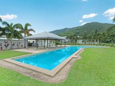 57/2-6 Fairweather Road Kamerunga Qld 4870 This modern unit is big enough for a small family. It is located in a secure gated complex within walking distance to local shopping, hotel, parks and public transport. The upstairs location provides a great outlook to nearby mountain ranges and enjoys cool breezes. Features include; - Full sized kitchen - modern appliances and servery to the balcony - Open plan living/dining room - quality Fujistu split air conditioner - Main bedroom - ensuite bathroom, walk in wardrobe, quality Fujitsu split air conditioner and personal door to the balcony. - Second bedroom - queen bed size, walk in wardrobe and quality Fujitsu split air conditioner and personal door to balcony. - Third room - large enough for a bedroom, parents retreat, home office or nursery. - Internal laundry. - Massive covered balcony - enjoy the elevation and cool breezes. - Lock-up garage with automatic roller door - secure your vehicle The complex is meticulously maintained by on-site managers with tropical gardens, two large resort style pools and BBQ gazebo. It is a short stroll to shopping facilities & public transport and a 2 minute drive to schools and supermarkets. An easy 15 minutes drive will take you to Cairns CBD and International Airport. Auction onsite 11:00am Saturday 11th April 2015. Features General Features Property Type: Unit Bedrooms: 3 Bathrooms: 2 Outdoor Carport Spaces: 1