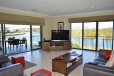 2/8 Diamantina Circuit Harrington NSW 2427 $620,000 180 degrees of water Townhouse - Property ID: 752150 From the sunrises that entice you out of bed to the spectacular sunsets you will never tire of the ever changing views... from the pelicans that glide past to the dolphins that frolic outside your living room With water out look from almost every room it feels like you are sailing - Open plan living, dining and kitchen complete with gas cook top and dishwasher - Access to the covered outdoor entertaining area flows from the living area - Ground floor master bedroom with WIR and ensuite featuring a corner spa - Up stairs the views just get better stretching across the Manning River to Manning Point - 2nd living space with access to the balcony - 2 good sized bedrooms with built-ins - Super sized master bathroom with walk in shower, large spa bath and display cabinet - Ducted air conditioning for year round comfort - Access to the river walkway - Powder room for the guests - North East aspect - Easy care garden...so much more