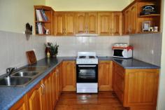 178 Mayne St Gulgong NSW 2852 $375,000 HIDING BEHIND THE TREES This quintessential family home offers an array of spectacular spaces both inside and out. The double brick rendered home is made up of 3 large bedrooms all with built in robes and ceiling fans the master also with air conditioning. The light filled country kitchen has plenty of cupboard space and offers both dine in and alfresco dining through the French doors on to the private leafy patio. The spacious living room has a real feeling of warmth and is a central hub of this family home, a formal living room or games / kids living room is adjoining. Linked to the main house via a sun room is a neat and tidy fully self contained one bedroom granny flat with air conditioning and its own separate power meter. Boasting a 1721m2 fully fenced corner block and backing on to the Gulgong golf course gives you a real feeling of space and privacy as you only have one neighbouring property. Possible subdivision opportunity also exist subject to council approval. The established Australian native garden surrounds the home to create your own private sanctuary with multiple outdoor entertaining areas. The car is not forgotten here with a double garage and workshop plus two carports. All in all a very well presented property with lots to offer. Inspection Times Contact agent for details Features Entertaining Area Established Gardens Rear Lane Access Built In Robes Floorboards Fully Fenced Open Fireplace Outdoor Entertaining Rumpus Room Secure Parking Shed Water Tank Workshop Land Size 1721 m2