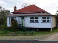 16 White St Stanthorpe QLD 4380 $155,000 • This property has been partially renovated and just needs to be finished off • Internally the house has been opened up to create a large lounge, dining and kitchen area • There is a new kitchen with large storage cupboards and Caesarstone bench tops • The kitchen includes a new 900 wide free standing electric oven with a 5 burner gas cook top and dishwasher • The master bedroom has a walk in rode and there is the potential to add additional bedrooms • The home is situated in a quiet street in sought after location, on a large 1012 m2 block of land • Outside the rear of the house is a large covered entertaining area and car port, with 2 small garden sheds • The back yard has a vegetable patch with plenty of room to establish gardens among some lovely granite rock formation Category House Property ID H2931 Land 1012 Sq m
