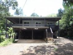 874 Terania Creek Rd Terania Creek NSW 2480 $575,000 Approximately 50 lush acres positioned 10 minutes drive from the beautiful Nightcap National Park and Protestors Falls. Recently renovated 4 bedroom home. The modern, refurbished kitchen includes a butchers bench and five burner gas stove. The kitchen opens out into an airy dining/living area that has polished timber floors and sliding doors that lead out onto beautiful, wide verandahs. There is a private, second dwelling that has been recently renovated and offers self-contained living and privacy from the main house. Huge, undercover area that has enough room for four cars! Tastefully landscaped with a terraced vegetable garden and walking tracks that take in the large variety of fruit trees. Access to your very own, secluded swimming hole positioned on Terania Creek. Photos do not do it justice! Solar hot water, 3x 5000 gallon (total approx 60,000 litres) tanks and mains power. Phone reception and internet available. The acreage has a balance of cleared, elevated areas with views over Terania Creek Valley and beautiful, ancient stands of rainforest. There is also a second creek and dam located on the property. A school bus goes past the front gate. With so much to offer, why not inspect