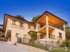 16 Sharon St Moorooka QLD 4105 $849000 A Lasting First Impression! This spacious modern residence with impressive views to the hinterland offers comfortable living and a resort-style family lifestyle. Neighbouring Toohey Forest, and offering the opportunity to come close to nature with walkways and parklands, this stunning residence is oriented for maximum light and commands a privileged position that strikes a lasting first impression. The ground level is a recreational retreat featuring a rumpus room complete with bar and retractable movie screen. Stock up on popcorn and enjoy perfect nights in with family and friends. Completing this level is 2 generous bedrooms. One boasting a 2 way bathroom and the other a private balcony with magnificent hinterland views. Upstairs the light filled central living hub is generous in size and accentuated by timber flooring. The neighbouring sleek kitchen, a home gourmand's dream with stone bench tops, sleek cabinetry and a private deck perfect for casual dining. This zone is complemented by the sensational outdoor entertaining area with breathtaking hinterland views that are the perfect backdrop for living. The central upstairs bathroom features floor to ceiling tiles and perfectly services the secluded sleeping quarters, the highlight of which is the master suite with luxury ensuite and walk in robe. Number 16 Sharon Street is a well designed and crafted residence that strikes a lasting first impression and offers a perfect relaxing lifestyle for the entire family to enjoy.