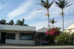 63 Pacific St Corindi Beach NSW 2456 $500,000 Reduced MASSIVE $100,000 PRICE REDUCTION Room to grow! The beach cottage rests on a whopping 1012m2 block and is only 200m (approx) to the breathtaking Corindi Beach. The home consists of 2 bedrooms, sunroom/rumpus room with access to backyard. Neat and tidy kitchen, dining area, separate large lounge room with ocean views. Small shop front is attached. Back deck offers ocean views and overlooks fully fenced massive backyard with loads of potential. Close to post office and general store. This home has a private yard and carport. This property has prior DA approval for a veterinary clinic. Corindi Beach is a growing coastal community and offers a relaxed lifestyle. The township consists of a primary school, local post office, shop, caravan park & skate park. The beach is patrolled in summer with a mix of safe swimming spots, rockpools for the kids to explore & viewing platforms to dream the day away. Located only 25 minutes to Coffs Harbour & 35 minutes to Grafton. Property: House Bedrooms: 2 Bathrooms: 1 Land Size: 1012 Sqm Rooms: Sun Room Council: Coffs Harbour