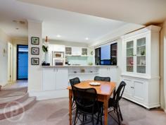 4/22 Macgregor St Wilston QLD 4051 EXTRA LARGE, PRIVATE AND STYLISH TOWNHOME Auction In rooms, Thursday June 4th @ 6:30pm, Place HQ, 33 Lytton Rd, East Brisbane. Conveniently located in prestigious Wilston, and just one of six townhomes in a secure gated enclave, this quality home is generous in size and exhibits subtle architectural flourishes that enhance the spacious layout. Popular Wilston Village, with a choice of cafes and restaurants is within walking distance, as are Home Zone and Reading shopping centres. Situated just 3km from the city it also enjoys close proximity to parklands, bikeways, RBH, the ICB, major arterial roads and the airport tunnel. Bus and train transport is a just a few minutes walk from home. The sparkling kitchen displays a timeless design and includes a pony wall that allows interaction with family and guests in the step-down, open plan living and dining area. Glistening Caesarstone benchtops, stainless steel appliances and glass splashback ensure optimum functionality as well as style. Two Queen size bedrooms with built-in robes are located on the upper floor including a family bathroom and king-sized master suite featuring ensuite and Walk In Robe with sliding glass doors leading out to a private balcony amid the treetops. Professionally designed and landscaped, the exquisite private garden and patio is accessed from the living area and provides a tranquil oasis for entertaining, alfresco dining or just a place to exhale and relax at the end of the day. Additional features comprise a powder room on the lower level, air-conditioning and security screens throughout, abundant storage, a vast remote double garage opening onto the courtyard, visitor parking and electronic gated entry to the pet friendly complex. With a total of 265 square metres of living space, a townhome of this size is rare. Welcome home to your new Place *This property is being sold by auction and therefore a price guide cannot be provided. The website may have filtered the property into a price bracket for website functionality purposes. Property Details Price AUCTION IN ROOMS Auction Thursday, 4 Jun 2015 6:30pm Total Area 265 m2