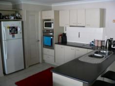 1/7 Freestone Dr Upper Coomera QLD 4209 $335,000 - $355,000 Great Investment Only 1 of 2! Priced to sell and offering prime investment potential. This well designed duplex in Upper Coomera is neatly presented and located for convenience making this the ideal investment. With a fantastic long term tenant in place, this property offers immediate income with the additional benefit of being in a location that is sure to always attract families. Features; - 3 bedrooms, with built in robes and ceiling fans - 2 bathrooms - Well equipped kitchen - Air conditioning in the living area - Tiles throughout with carpet in all bedrooms - Undercover patio area - DLUG - Located in the fastest growing suburb on the Gold Coast. There is no beating the position of this property which is situated in the heart of Upper Coomera, located within minutes of schools, shopping, public transport and the M1 motorway. If you do not move quickly you will miss out on this prime investment opportunity! So contact Mick Wells today to secure your private inspection and full disclosure statement. Start you portfolio here. You will be glad you made that call. DISCLAIMER: We have in preparing this advertisement used our best endeavours to ensure the information contained is true and accurate, but accept no responsibility and disclaim all liability in respect to any errors, omissions, inaccuracies or misstatements contained. Prospective purchasers should make their own enquiries to verify the information contained in this advertisement.
