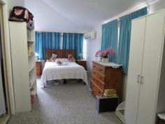 32 Reynolds St Bowen QLD 4805 $370,000 SPACE, LOCATION, SHED House - Property ID: 785093 BEST BIG 4 BEDROOM HOME, BEST masonry block 3 bay shed, BEST yard access from two street frontages, BEST spare room and downstairs living space. This is all on 1,027 sq. metres. We think this one offers more than the average home and must go on your shopping list. UPSTAIRS there are 4 bedrooms plus a sleep-out. DOWNSTAIRS there are another 3 rooms PLUS rumpus PLUS bathroom PLUS storeroom PLUS laundry. Yes, there are many extras in this extraordinary home as you can see. THE BIG FAMILY KITCHEN is friendly and open to the dining room for family conversation and features the biggest walk-in pantry you could wish for. THE LOUNGE is augmented by the large enclosed front verandah providing even more space for the family to spread out - not forgetting the massive rumpus underneath. THE GARDEN is over 1/4 acre and fully fenced and, for pets, the back garden is separated from the front by gates. There is plenty of space for a vege patch. This is a home to see and get the feel for. Arrange to inspect it today - give us a call. Print Brochure Email Alerts Features Land Size Approx. - 1027 m2 4 bedrooms 3 spare rooms Huge 3 bay shed