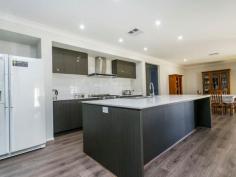 42 Tengala Drive Jordan Springs NSW 2747 Why Build This attractive family home in Penriths' latest growing suburb, is ideal for those who are after an executive style, contemporary home with the huge bonus of being located in only walking distance from the Town Centre, High and Primary Schools, as well as day care centre and magnificent lake. Just 12 months young and presented with the highest attention to detail, this is one of the most detailed orientated and carefully constructed homes found in the suburb. Positioned on a corner block of 460m2 approx. and a built area of 28.6 sqs approx, with an astounding street appeal. Some of the features that make this an exceptional home are: - Large Theatre (media) room perfect for entertaining - 4 good sized bedrooms all featuring built in robes - Master bedroom features oversized walk in robe (change room) and private ensuite with twin basins - Gourmet kitchen perfect for the at home chef, complete with stone bench tops 900mm s/steel gas cooking, dishwasher and oven flowing into a walk in pantry - Large meals and family area with timber stacker doors leading to an under main roof alfresco area with gas/electricity provisions perfect for entertaining- Great sized laundry, complete with walk in linen room. Great sized yard area with space for a pool (STCA) - Finished with ducted reverse cycle air system, alarm, remote control to garage with internal access and much more. So don't delay, call Maurice today on 0417 296855