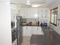 2 Andrew Ct Boyne Island QLD 4680 $470,000 NEG Excellent Home With Room To Park the Caravan. If you love to entertain or enjoy outside living this property is for you. This beautifully presented spacious 3 bedroom home is located on a level 781sqm corner allotment and offers a large undercover entertainment area with a sparkling saltwater in ground pool. The home is surrounded by a low maintenance yard with a large carport ideal for a caravan/boat. Situated only a short stroll to the Boyne River with easy access to all amenities and schools, this property is worth your time and will surprise you. Neutral colour tones decorates this lovely home throughout. Spacious is not the only feature of this well presented home, it boasts: *Large air-conditioned main bedroom with a resort style ensuite and built-in wardrobe. *Generous size bedrooms is with built-ins and ceiling fans, 1 bedroom is air conditioned. *A surprising large air-conditioned family room with a separate dining room. *Well-appointed kitchen with plenty of storage, bench space and stainless steel appliances. *Living/dining area of the kitchen opens up to a lovely large undercover entertainment area. *A large internal laundry with plenty of cupboard space and access to the outside. *The main bathroom features a shower bath and separate toilet. *Low maintenance yard with in ground salt water pool with pool equipment & pool cover *Large undercover entertainment area with a carport ideal for a boat or caravan. *Garden shed for storage. This property is ready for new owners to settle in and enjoy a coastal lifestyle. Golf, fishing and magnificent waterways near-by completes the picture. Don't wait call me today on 0408 738 767 to book your inspection. Property Snapshot Property Type: House Construction: Brick Veneer Land Area: 781 m2 Features: Built-In-Robes Dining Room Dishwasher Ensuite Established Gardens Family Room Fenced Back Yard Garden Shed In-Ground Pool Lounge Outdoor Living Read more at http://tannumsands.ljhooker.com.au/AKBFKE/2-andrew-court-boyne-island#XdO6UkDBerKOUGJY.99