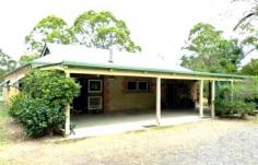 224 Moorabinda Dr Sunshine Acres QLD 4655 Negotiable $410,000 LIFESTYLE 5 ACRES CLOSE TO TOWN Fully fenced solid brick Federation style home built by Stone Mason is completely insulated with ducted air-conditioning, wood stove in lounge, dining and combined kitchen with generous Tasmanian Oak cupboards, pantry and gas stove. Separate laundry with linen & utility storage. Guests bathroom has double shower. Master bedroom has WIR and spacious en-suite with double shower. Massive enclosed rumpus/entertaining area at rear with hardwood flooring, bar and sink, glass Louvres on two sides overlooking cleared rear paddocks with small dam. There are multiple sheds, wood storage, work room, double garage and storage plus additional partially bricked shed suitable for caravan or stable conversion. 2 x 10,000 plus 1 x 5,000gal tanks, grey water system plus Downmus composting septic system. There is ability to extend the existing residence as further supply of bricks on site. Perfect for young or semi retired couple looking for a rural change. DETAILS ID #: 0000266446 Price: Negotiable $410,000 Type: House Bed: 2 Bath: 2 Car: 6 Land Area: 2.05 hectares (approx)