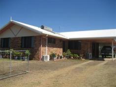  627 Gentle Annie Rd Ambrose QLD 4695 $495,000 RURAL RETREAT ON 69.57 HECTARES- BRICK HOME AND LARGE SHED If you have been looking for a rural retreat and hobby farm this property is for you. This propery is located only 38klms from Gladstone City. All the hard work is done with an immaculate lowset three bedroom brick home situated on the top of a hill.  Enter the home to the lounge room which is combined with dining and kitchen area, vinyl floor and airconditioned. Good working laminated kitchen with heaps of cupboards and an electric stove. Fans throughout the home. The three bedrooms are large with carpet to th efloors and built in wardrobes. The main bedroom is airconditioned and features an ensuite. The second bathroom has a full length bath and separate shower. Large linen cupboard. Two toilets. A full length concreted patio to the back of the home to enjoy the breezes and relax afetr a big day. A workmans delight with a large 8m X 6m shed. Fully fenced around the house yard and established lawns and gardens. 3 tanks, solar hot water and solar power (9 panels). Not a thing to be done, just move in. Call me on 0400 017 773 to arrange an inspection.   Property Snapshot  Property Type: House Construction: Brick Veneer Land Area: 171.90 acres Features: Built-In-Robes Ensuite Established Gardens Fully Fenced Yard Patio 