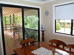 28 Beelong St Macleay Island QLD 4184 $339,000 Water Views, 3 Bedrooms, Beautiful Beelong Street! This quality high-set is a much-loved family home with lovely water views across to Stradbroke Island. Positioned on a big 1,050 m2 block in sought-after Beelong Street, this property is very handy to water access and is loaded with features including: * Spacious open plan living and dining flows to covered outdoor living area * 3 built-in bedrooms, main with walk-in robe and sliding door to front deck * Roomy kitchen with breakfast bar, electric cooking and pantry * Relaxing covered front veranda with good water views to Straddie * Family bathroom features bathtub and separate shower, plus separate toilet * Fully concreted underneath with good height and plenty of potential * Large laundry/store room and an extra toilet downstairs * Big concreted and decked outdoor living areas downstairs * Single garage plus multi vehicle parking potential underneath * Generous 1,050 m2 block, nicely landscaped like the Botanic Gardens * Excellent position on waterfront street near north-eastern tip of Macleay This quality family home is beautifully presented and features extras like ceiling fans throughout, polished timber floors, security screens, the list goes on. Downstairs has excellent height and is fully concreted, with obvious development potential as a toilet and laundry are already in place. There is plenty of room for a workshop area, boat and trailer, etc., and it would be relatively simple to create self-contained living downstairs for guests or extended family. The back yard is a gardener's delight, with a profusion of plants and shrubs giving a great tropical atmosphere. Beelong Street is a beautiful part of the island, catching the prevailing breezes and with picture postcard views to Stradbroke Island. The sheltered swimming area at Pat's Park is nearby, and excellent boat ramp facilities at Dalpura Beach are also just a couple of minutes away. Access to the waterfront via a block of Council land is less than a minute's walk down Beelong Street. This would be an idyllic place to enjoy our unique island lifestyle, and Macleay Island has so much to offer, with a friendly country town atmosphere, fast reliable ferries and with shops, parks, clubs and essential facilities here on the island and ready for you to enjoy. For more information or to arrange your inspection and free pick-up from the jetty, please contact the listing agent. Property Snapshot Property Type: Water Views (some) Construction: Hardiplank Land Area: 1,050 m2 Features: Built-In-Robes Decking Dining Room Fully Fenced Yard Landscaped Gardens Lounge Outdoor Living Polished Timber Floors Security Screens Undercover Entertainment Area Verandah Walk-In-Robes Waterview