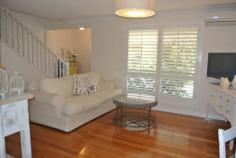 5/45 Cambridge St Carina Heights QLD 4152 Offers High $400K's Property ID 34207 Have you been looking for something that just feels "right" when you walk through the door for the first time? We welcome you to inspect this two storey townhouse, which is presented beautifully by a very houseproud owner. From the entry you will feel a homely, yet modern atmosphere, created by the Australian Blackbutt polished hardwood floors, and the classic white Plantation shutters throughout. You will find living and entertaining easy, with proper lounge and dining areas, leading outside to the pet friendly courtyard, which also is bigger than you may expect. The kitchen is light and airy, private, and overlooks the outside. Complete with full pantry, stainless steel oven and dishwasher, it fresh and ready to move into straightaway. Upstairs, you will find two good sized bedrooms, with the master including a walkin robe, and the renovated bathroom, finished with Italian tiles and double vanity. You have to appreciate the extras this property has, such as a proper separate laundry and toilet also downstairs as well as plenty of storage space. Its a small complex of only 6, with low body corporate fees, at approximately $2000 per year. Don't miss out on this one, you won't find another that feels the same