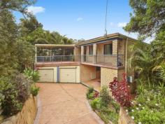 4 Wycombe Rd Terrigal NSW 2260 Offers Over $890,000 Situated in a quiet cul-de-sac and capturing ocean views from an elevated position lies this beautiful and immaculately presented 5 bedroom house. This lovely family home is open plan throughout with an additional kitchenette downstairs allowing for potential to rent out separately or utilise for teenagers or in-law accommodation. Other features include- Five good size bedrooms, all with built-in robes Four bathrooms (including ensuite to the master bedroom) Multiple living areas plus multiple outdoor entertaining areas Indoor therapy swimming pool (heated) with spa area and spa jets Fully fenced and private landscaped backyard with feature pond Air conditioning, security alarm, and nine solar panels on the roof Loads of storage throughout plus purpose built storeroom. Remote control garage plus newly installed carport. Two driveways allows for lots of off street parking available. Recently been valued over $900,000. FOR SALE Offers Over $890,000 FEATURES GENERAL FEATURES Property Type: House Bedrooms: 5 Bathrooms: 4 Land Size: 601 m? (approx) INDOOR Ensuite: 1 Alarm System Built in Wardrobes Dishwasher Air Conditioning