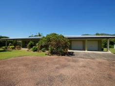 34 Thomas Ct Bulgun QLD 4854 $450,000 SPACIOUS LIVING ON LARGE BLOCK BORDERING CREEK This well presented 3 bedroom home has a lot to offer in the way of serene surroundings as well as proximity to the centre of Tully, approximately 10 minutes drive. The block is approx. 8002m2 in size. Tiled throughout and with verandahs around three sides for shade from Easterly and Westerly sun, this home has a coolness even on warm days. The sleek, modern kitchen accomodates barstools and is a great size for those who love to cook and entertain. A viewing window through to the living room ties both spaces together and makes sure that light as well as conversation flow through to the living space. Views from the dining table are that of beautiful green rainforest foliage and distant mountain ranges. Adjacent to the kitchen, the large office space has access to the back patio. 3 bedrooms all feature built-ins with mirrored sliding doors. A vast amount of storage is offered in this home with floor-to-ceiling cupboards running the length of the hall. The bathroom offers a shower and single vanity with separate toilet adjacent. The laundry is a great feature being so large in size and boasting an internal clothesline for those grey Tully days. The double bay remote operated roller door garage is a great asset to the property featuring a small kitchenette and a drive through roller door to the backyard as well as the ability to park 4 cars comfortably. The driveway has ample facilities for off-street parking and is well maintained, just like the gardens . The back patio has a bench and sink configuation which is currently being used for gardening purposes, but could easily serve as part of an outdoor kitchen if needed. The back yard also features a good size garden shed for all your gardening and hobby storage solutions. This house has a lot to offer and is definitely worth a look. For any enquiries do not hesitate contacting one of our friendly sales team at LJ Hooker Tully (07) 4068 1100 Property Snapshot Property Type: House Construction: Concrete Block Zoning: RESIDENTIAL (RURAL) Land Area: 8,002 m2 Features: Built-In-Robes Established Gardens Garden Shed Outdoor Living Remote Control Garaging Renovated Security Screens Storage Undercover Entertainment Area Verandah