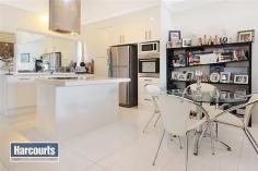 4/12 Magdala St Ascot QLD 4007 This fully renovated architecturally designed two bedroom, 2 bathroom apartment is located in the heart of Ascot, just a short stroll to the vibrant Racecourse Road and Portside precinct. Situated in a prime position with a desirable north/east aspect in a small contemporary prestige complex of only 9. Enjoy cooking up an epicurean feast in your inspired kitchen with induction cooktop overlooking a large combined dining/living room which also opens out through French styled doors to a north/east balcony. The cathedral ceilings throughout enhances the spacious feel. Extra features include: - Queen sized master bedroom with ensuite - Second bedroom complete with full wall built-ins - Modern light filled main bathroom with internal laundry - Beautiful plantation shutters throughout - Air conditioning in main living area - Security screens throughout - Single lock-up garage Take a short stroll along the river to the Hamilton Harbour and Portside precincts famous for their award winning restaurants, gymnasiums and Dendy Theatre. The Brisbane CBD is only 5kms away easily accessed by the City Cat or bus. Easy access to airports, north and south arterial roads to the Gold Coast and Sunshine Coast making this home very desirable. Apartments like this don't come available too often, so make this a must to see - you will be impressed. For further details or to arrange a private inspection do not hesitate to contact Loretta Accornero on 0412 989 087 to arrange a private viewing. Tenure Freehold Property condition Renovated Property Type Unit Unit style Number in block: 9, Number of levels: 1 Flooring Tiles, Polished and Carpet Heating / Cooling Split cycle a/c Property features Safety switch, Smoke alarms Kitchen Modern and Open plan Living area Open plan Main bedroom King and Built-in-robe Ensuite Separate shower Bedroom 2 Double Additional rooms Family Main bathroom Separate shower Family Room Balcony / deck and Heating / air conditioning Laundry In bathroom Aspect North, East Water heating Gas Locality Close to transport, Close to shops, Close to schools