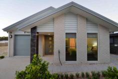 6 Aurora Road Tannum Sands Qld 4680 $315,000 Property ID 31373 Brand new and never lived in - PRDnationwide Gladstone is proud to present to the market 6 Aurora Road, Tannum Sands. Located in Tannum Blue estate just minutes to Tannum town centre, tavern and patrol beaches, this is a perfect starter home or investment property. Three spacious bedrooms all with ceiling fans and sliding wardrobes - the master with ensuite and walk in robe. Down the hall the bathroom has been designed for functionality including separate shower and bath beautifully finished with large mirror and vanity. Open plan lounge, dining and kitchen has plenty of windows to allow for breezes all year round the split system air conditioning in this space a bonus. The kitchen has been fitted with stainless steel gas cooktop, electric oven and a large breakfast bar. Generous sized dining area with sliding door access to the tiled outdoor entertainment area there is access via the dining or living area - the large doors allow for plenty of natural light. Fully fenced courtyard garden with low maintenance advanced tropical landscaping. 3KW solar panels and a smart energy home system added to security screens, solar tinted doors and windows and custom made blinds throughout also ensures plenty of extras in the price. Combined garage and tiled laundry area - it is surprisingly spacious. Vendors offering a guaranteed 7% gross income for 12 months to utilise this fantastic G and D Lawrie build as a display home. Land area 0.03HaAir Conditioning