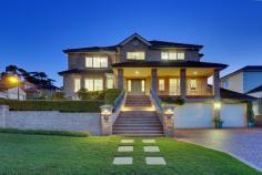 12 Lyndhurst Way Belrose NSW 2085 Unparalleled Prestige & Position In a highly coveted blue ribbon setting and commanding an aspiring vantage point to capture spectacular North-Easterly views of Oxford Falls across to the ocean, this exceptional 5 bedroom executive residence defines luxury family living. Fluid open plan design incorporating family room, casual meals and eat-in gas kitchen features an effortless connection to the tiled alfresco covered entertaining patio. The multiple living areas also include a rumpus room and a very large lounge and dining room which are well separated from the casual living spaces. All bedrooms are very generous in size especially the sumptuous master suite featuring a huge walk- in-robe and ensuite bathroom with twin sink vanity, bath, shower and separate toilet. The remaining bathrooms consist of a 3 way bathroom on the upper level and a guest bathroom downstairs. The stunning fully automated self cleaning resort style infinity pool and spa with lavish tiled surrounds and adjoining level grassed yard is framed by expertly manicured gardens and frameless glass fencing. The pool area is adorned with some beautiful touches such as a water feature on the amazing stack stone pool wall, solar heating, gas heating for the spa, LED lighting and an advanced touch style panel controlling the automatic chemical monitoring system. * Ducted reverse cycle air conditioning, gas HWS, gas point for BBQ and separate built-in BBQ * Eat-in kitchen with large gas cook top, walk-in pantry, dishwasher and breakfast bar * Triple car garage with internal access, auto doors, huge storeroom and wine cellar/storage area * Outdoor hot and cold shower plus timber storage units plus large tiled surrounds for extra outdoor setting and sun lounges, garden lighting and the pool has a compliance certificate * Huge executive home surrounded by equally impressive luxury residences. 753sqm block in peaceful enclave enjoying fabulous outlook * Torrens title + community title attached. This property is situated in a highly regarded location that is within an estate. The estate manages the upkeep of the private roads, landscaping, gardens, lawns, lighting, plumbing and any common property. Your community title contribution is $385 per quarter. Council rates are $494 per quarter * For sale by Auction On Site 23rd May 2.00pm