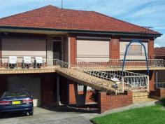 18 Mirrabooka Rd Lake Heights NSW 2502 $459,000 Dual Income! Solid brick home with 3 large bedrooms upstairs, currently tenanted. 1 Bedroom Downstairs, currently tenanted.(NCA). Also has a lock up garage. Backing onto Lake Heights Junior FC. Ideal Investment or easily converted into a huge family home. Schools,transport and shops are within metres.