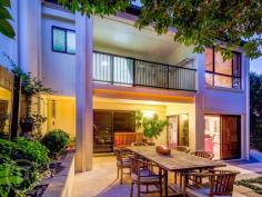 4/22 Macgregor St Wilston QLD 4051 EXTRA LARGE, PRIVATE AND STYLISH TOWNHOME Auction In rooms, Thursday June 4th @ 6:30pm, Place HQ, 33 Lytton Rd, East Brisbane. Conveniently located in prestigious Wilston, and just one of six townhomes in a secure gated enclave, this quality home is generous in size and exhibits subtle architectural flourishes that enhance the spacious layout. Popular Wilston Village, with a choice of cafes and restaurants is within walking distance, as are Home Zone and Reading shopping centres. Situated just 3km from the city it also enjoys close proximity to parklands, bikeways, RBH, the ICB, major arterial roads and the airport tunnel. Bus and train transport is a just a few minutes walk from home. The sparkling kitchen displays a timeless design and includes a pony wall that allows interaction with family and guests in the step-down, open plan living and dining area. Glistening Caesarstone benchtops, stainless steel appliances and glass splashback ensure optimum functionality as well as style. Two Queen size bedrooms with built-in robes are located on the upper floor including a family bathroom and king-sized master suite featuring ensuite and Walk In Robe with sliding glass doors leading out to a private balcony amid the treetops. Professionally designed and landscaped, the exquisite private garden and patio is accessed from the living area and provides a tranquil oasis for entertaining, alfresco dining or just a place to exhale and relax at the end of the day. Additional features comprise a powder room on the lower level, air-conditioning and security screens throughout, abundant storage, a vast remote double garage opening onto the courtyard, visitor parking and electronic gated entry to the pet friendly complex. With a total of 265 square metres of living space, a townhome of this size is rare. Welcome home to your new Place *This property is being sold by auction and therefore a price guide cannot be provided. The website may have filtered the property into a price bracket for website functionality purposes. Property Details Price AUCTION IN ROOMS Auction Thursday, 4 Jun 2015 6:30pm Total Area 265 m2