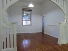 101 Pine Mountain Rd Brassall QLD 4305 379,000 2312m2 (Over half an acre) of fully fenced, shaded tree, spacious bliss located close to the CBD yet only a stroll away from shops, beauty, takeaway, IGA, bus stop, schools and all that you ever need. Be on the Warrego Highway in only a few turns of the steering wheel and when you finish with the hustle n bustle of the outside world…come home and relax in your massive, scenic rear yard paradise! Bring the dogs, trucks, trailers, motorhome or maybe even a granny flat to plonk on this sprawling piece of Australia. The decorative front fence has just had a fresh lick of paint, as has both the internal and external areas of the home. A carport sits at the ready to park the pride and joy beneath and up to 3 small cars can easily park in under the home on the concreted slab, where you will also find the laundry area. The covered front veranda is the place to sit and watch the world pass by and inside you will find timber flooring mostly thoughout, 2 large bedrooms (1 with an adjoining sleepout area that would make a perfect ensuite/walk in robe conversion), a large air conditioned formal dining room (that would easily convert into a 3rd bedroom), an adjoining lounge room that opens into another sleepout that also extends into the supersized dining/family room that features almost a wall of beautiful stained coloured glass windows. A separate study leads out from the dining/family room area, or if you would prefer your laundry to be upstairs…then it’s the place for it! The country styled kitchen is the perfect theme for the surrounding timber tongue & groove walls & ceiling, plus the decorative fretwork. A 12 month old oven takes care of business and you have plenty of room for all you need to do within the kitchen thanks to the large island bench. The bathroom definitely does the job required of it, roof insulation keeps the climate just the way you like it, high ceilings are everyone's favorite, the roof guttering has been upgraded, as has the sewer lines and storm water exit pipes. A garden shed is on hand for the lawn and garden equipment and if that needs servicing….simply walk down to the local mower shop! Features Study Floorboards Shed Fully Fenced