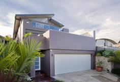 31 Wyndora Ave Freshwater NSW 2096 $2,600,000+ A Freshwater family residence like no other. Architecturally designed from the ground up, this solid double brick three level family home boasts extensive entertaining, low maintenance and is positioned in a premiere location. * Four bedrooms, all with built-ins, on the same level * Master bedroom with dual robes, and ensuite * Heated flooring throughout, reverse ducted a/c, dumb waiter * Two living rooms, wet bar area, two entertaining decks and all offering water and district views * Security alarmed, remote driveway gates, two outdoor showers * Established gardens, external irrigation systems, commercial refridgeration * Wine cellar and designer suspended swimming pool with gas heating * Four car garage, with mezzanine storage and wash up basin Ocean view to the north east, Manly and surrounding district views to the south, high ceilings with louvred windows for natural light and soothing coastal breezes. A sought after location being just a walk to either Curl Curl or Freshwater beaches, Freshwater Village, the CBD express transport, Jacka Park and primary schools. Land Size: 405 sqm Bidding Guide from Mid to high $2m's Size 405m² approx.