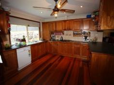 3 George St Cooran QLD 4569 $380,000 Neg Family Affair - Bring Teenagers and Mum and Dad Beautifully positioned on picturesque 1449m2 (58 perches *approx) corner allotment your opportunity to enjoy the quality lifestyle living in Cooran offers only minutes to Pomona and close proximity to Maroochydore and Noosa etc. The well presented two storey colonial styled residence offers 5 bedrooms, a huge master with full sized ensuite, the guest area with its own bathroom, just great for family visitors. The family is well catered for with 3 bedrooms upstairs (all fully built-in) another bathroom with bath, WC and separate shower. This well designed home offers so much with stunning tassie oak kitchen, 2 spacious living areas including roomy lounge/dining flowing onto private deck overlooking the secret garden and roomy lock up shed ideal storage area. The rumpus under with internal stairwell access offers the perfect family scenario or separate living for mum and dad. NB; Subject to Council consent perhaps a block may be subdivided in the future. Currently rented at $380.00 per week with excellent tenants in place.