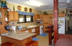 224 Moorabinda Dr Sunshine Acres QLD 4655 Negotiable $410,000 LIFESTYLE 5 ACRES CLOSE TO TOWN Fully fenced solid brick Federation style home built by Stone Mason is completely insulated with ducted air-conditioning, wood stove in lounge, dining and combined kitchen with generous Tasmanian Oak cupboards, pantry and gas stove. Separate laundry with linen & utility storage. Guests bathroom has double shower. Master bedroom has WIR and spacious en-suite with double shower. Massive enclosed rumpus/entertaining area at rear with hardwood flooring, bar and sink, glass Louvres on two sides overlooking cleared rear paddocks with small dam. There are multiple sheds, wood storage, work room, double garage and storage plus additional partially bricked shed suitable for caravan or stable conversion. 2 x 10,000 plus 1 x 5,000gal tanks, grey water system plus Downmus composting septic system. There is ability to extend the existing residence as further supply of bricks on site. Perfect for young or semi retired couple looking for a rural change. DETAILS ID #: 0000266446 Price: Negotiable $410,000 Type: House Bed: 2 Bath: 2 Car: 6 Land Area: 2.05 hectares (approx)