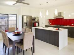6 Sandridge Way Smithfield Qld 4878 OFFERS OVER $510,000 HIA Award Winning Home 2014 - ULTRA CHIC LIVING Your jaw will drop as you enter this ultra-modern 18 month young property... It definitely has the WOW Factor. So much that this actual home won HOME OF THE YEAR in 2014. Ultra spacious open plan living at its finest with beautiful tiling, high ceilings and feature glass sliding doors to the entertainment area. Designed with indoor outdoor living in mind you will spend endless nights entertaining with family and friends whilst chatting around the built in outdoor barbequing area. * 4 bedrooms main with ensuite and split system air conditioning throughout. * 2 showcase bathrooms * Positioned on a low maintenance block with garden shed and concreted area. * Great kitchen with Caesar stone bench tops * Built in fabulous BBQ area * Smart estate with National Broad Band throughout Property Snapshot Property Type: House Construction: RENDERED BLOCK Features: 2 Bathrooms 2 Living Areas 4 Bedrooms Airconditioned Built In Wardrobes Ceiling Fans Close to Park Close to Schools Close to Shops Close to Transport Double Lock up Garage Ensuite Entertaining area Gas Cooking Large Entertaining area Lots of Storage Separate Toilet