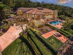 17 Coralcoast Drive Tallai, QLD 4213 Offers over $1,295,000 Huge Family Estate with Gold Coast Skyline Views House - Property ID: 757446 5 BED, 4 BATH, 2 STUDY, 6 CAR, POOL, LAND 5,632m2 WARMTH, SOPHISTICATION and commanding an exceptional street presence, this stunning luxury acreage estate provides the ultimate family home with extraordinary proportions, magnificently high ceilings and sweeping vistas of the gold coast skyline. Wrapped in terraces and decks, this grand home enjoys elegant entertaining areas for every occasion, formal living flows to relaxed over-sized family entertaining areas with floor-to-ceiling glass that flow freely to the surrounding decks taking full advantage of the shimmering panoramas and spectacular views. A lower level games room gives breadth to a family living environment offering easy access to the sparkling in ground pool. The home's accommodation is delivered through, five generous bedrooms positioned separately and away from the entertaining portion of the home and provides peaceful havens to rest and restore. The generous master embraces absolute privacy with unsurpassed style and elegance including deep spa and terrace access. Second, third and fourth bedroom are truly generous in size with built-in robes, while each of the bathrooms are fresh and private. The spacious and inspiring office is perfectly located and will surely please. A double driveway includes triple garage, massive workshop with internal storage plus rare gated side access for more vehicles / boat / caravan or extra useable land surrounded by manicured grounds. Available for private viewings over the Christmas holidays. Features include: . A Timeless and Gracious residence with a floor plan of 647sq m . Wide wraparound balcony captures uninterrupted Gold Coast Skyline Views . A Grand double height Foyer . Spacious interiors feature elegant formal and casual living . High ceilings throughout . Games room on the lower level with full wet bar leading to paved patio . Inviting sparkling in-ground swimming pool with entertaining area . Master suite with a deluxe en-suite leads to terrace and private spa . Spacious and inspiring home office . Five king-size bedrooms, four private bathrooms with powder room . 3 garage auto entry with internal access with 11.6 x 6.7 workshop . Stunning terraced grounds and manicured gardens with level lawns . Double driveway with Triple automatic garage and rare side access for more vehicles / boat / caravan or extra useable land A statement in class and sophistication and represents a once-in a-lifetime opportunity to secure this gracious residence on approx 5,632m2 in a premier location with only minutes to main stream shopping, caf society and schools - Don't miss this opportunity! Print Brochure Email Alerts Features Land Size Approx. - 5632 m2