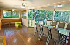 138 Brighton Terrace Sandgate QLD 4017 $770,000 Stunning Queenslander, Must Be Seen! Come along and have a look at this fabulous home - this stunning Queenslander is waiting for your inspection! The large kitchen and dining areas open on to beautiful side and back decks - the side deck is sheltered with shade sails, perfectly catching the morning sun, while the back deck is a huge 40m2 of covered floor space, perfect for parties and barbeques. The lounge room opens on to the front veranda with views to the bay and beautiful bay breezes. The master bedroom, with stunning stained glass bay window, opens onto the front deck with views out to the bay on one side and large sunroom on the other - this would make a great nursery space. Two bathrooms upstairs, the main with a claw foot bath and separate shower. Downstairs you have the third bathroom and laundry along with two large rumpus rooms - one set up with a stove and kitchen sink, which would make this an ideal retreat for the kids, parents, or extended family. There is ample room undercover for four cars and the boat or van, leaving lots of room for the kids to play in the garden in this fully fenced and secure home. All this situated just metres to the bayside, with long coastal walkways/bikeways boasting cafes and restaurants just a short walk to the village of Sandgate which would have to one of the best communities in Brisbane! Great schools and communities services, just 30 minutes by train to the city, close to Brisbane Airport and easy access to both the Gold and Sunshine coasts. This beautiful home will not last long - call Allan Brookes today to arrange your viewing! Property Snapshot Property Type: House Construction: Timber Land Area: 655 m2 Features: Air-conditioning Balcony Built-In Wardrobes Ceiling Fans Close to Schools Close to Shops Close to Transport Dishwasher Elevated Block Fully Fenced Yard Garden Shed Gas High Ceilings Internal Access via Garage Internal Laundry Internal Stairs Landscaped Gardens Lock-Up Garage Low Maintenance Block Outdoor Living Rumpus Room Security Screens Shading or Sun Control Stainless Steel Appliances Storage Study Sunroom Tiles Timber Floorboards Undercover Entertainment Area Verandah