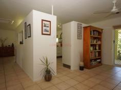 34 Thomas Ct Bulgun QLD 4854 $450,000 SPACIOUS LIVING ON LARGE BLOCK BORDERING CREEK This well presented 3 bedroom home has a lot to offer in the way of serene surroundings as well as proximity to the centre of Tully, approximately 10 minutes drive. The block is approx. 8002m2 in size. Tiled throughout and with verandahs around three sides for shade from Easterly and Westerly sun, this home has a coolness even on warm days. The sleek, modern kitchen accomodates barstools and is a great size for those who love to cook and entertain. A viewing window through to the living room ties both spaces together and makes sure that light as well as conversation flow through to the living space. Views from the dining table are that of beautiful green rainforest foliage and distant mountain ranges. Adjacent to the kitchen, the large office space has access to the back patio. 3 bedrooms all feature built-ins with mirrored sliding doors. A vast amount of storage is offered in this home with floor-to-ceiling cupboards running the length of the hall. The bathroom offers a shower and single vanity with separate toilet adjacent. The laundry is a great feature being so large in size and boasting an internal clothesline for those grey Tully days. The double bay remote operated roller door garage is a great asset to the property featuring a small kitchenette and a drive through roller door to the backyard as well as the ability to park 4 cars comfortably. The driveway has ample facilities for off-street parking and is well maintained, just like the gardens . The back patio has a bench and sink configuation which is currently being used for gardening purposes, but could easily serve as part of an outdoor kitchen if needed. The back yard also features a good size garden shed for all your gardening and hobby storage solutions. This house has a lot to offer and is definitely worth a look. For any enquiries do not hesitate contacting one of our friendly sales team at LJ Hooker Tully (07) 4068 1100 Property Snapshot Property Type: House Construction: Concrete Block Zoning: RESIDENTIAL (RURAL) Land Area: 8,002 m2 Features: Built-In-Robes Established Gardens Garden Shed Outdoor Living Remote Control Garaging Renovated Security Screens Storage Undercover Entertainment Area Verandah