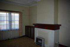52 Raymond St Wellington NSW 2820 $210,000 Property Description Preferred location and plenty of charm! There are generous living areas in this lovely weatherboard family home plus features from the era such as decorative plaster ceilings, stained timber architraves, period light fittings, recessed storage cupboards and ornate timber work, all offered as a blank canvass for the next owner to improve upon. This style of home comes up beautifully with contemporary improvements especially in the kitchen and bathroom areas. An impressive floor plan that has a large & welcoming front entranceway, generous sized bedrooms (three), built in wardrobe while the lounge & dining rooms can be partitioned by recessed sliding glass doors. Its kitchen reflects the period galley style design with plenty of cupboard space, laminated bench tops plus an adjacent dining room that leads to the spacious loungeroom. Owners of other similar properties in the area have opened up the wall between the kitchen & dining, then applied contemporary improvements with the result being quite spectacular. The bathroom, well its original and crying out for attention. Separating the main bedrooms at the front of the home is a large hallway/vestibule where you can display your prized paintings and family portraits etc. Encompassing the property are well established lawns and gardens with a side driveway that leads you to the lock up garage plus other storage sheds in the yard. A great opportunity exists to transform this grand old Gem into a really special family home where its location gives you even more reasons to make it your own. Images reflect properties at the time when the photos were taken. Seasonal changes & maintenance can affect the current presentation and prospective purchasers are urged to use them as a guide only. Property Features Land Area 809.4 sqm