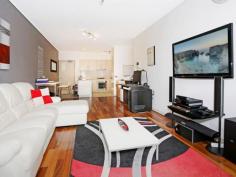 111/1 The Piazza Wentworth Point NSW 2127 $550,000 Ultra Modern Courtyard Apartment You will be impressed the minute you step inside this immaculately renovated courtyard apartment. Quietly positioned with a North facing aspect to allow for maximum natural light, this home is further enhanced by the generous air conditioned living area with polished floorboards, a full sized gourmet gas kitchen with ample bench and cupboard space and queen sized bedroom with built in wardrobes. Other features include *Internal laundry *Sleek finish bathroom with shower over bath *Secure and conveniently positioned car space *Generous 33sqm sun filled courtyard *Dual entry *Access to the Pulse Lifestyle Club . Facilities include indoor & outdoor pools, gym and tennis courts plus so much more! *Only a short stroll to the Piazza Restaurants, Cafe's and shops including medical centre and pharmacy *Moments to transport of buses and ferry services *Low outgoings with excellent rental secured until end July 2015 *Homebush Bay Bridge due for completion in 2016 giving access to Rhodes Train Station and shopping hub.