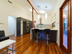 25 Sleaford St Chapel Hill QLD 4069 $895,000 FOR THE LIFESTYLE YOU DESERVE House - Property ID: 788118 A private sanctuary awaits behind the secure unassuming faade. When you enter you'll think you've stepped into the grounds of a lush tropical resort as you make your way along the palm tree studded full length wrap around deck. From the main entry you have formal lounge and dining rooms with gleaming polished boards soaring ceilings and central fireplace ready to warm those cooler nights. The dining room flows through to the stunning kitchen featuring sparkling stone tops and loads of glistening white cabinets and stylish stainless steel appliances and the added convenience of a breakfast bar. The casual family room offers yet another space for families, friends to gather and offers a seamless transition over to the rear deck for larger get togethers where you can still entertain in complete style whilst you are still part of the action and able to interact with your guests. At the rear of the house is the main bedroom wing housing 3 huge bedrooms, the master with a full wall of robes and stylish ensuite, the remaining bedrooms have ceiling fans and built-in robes and a glamorous main bathroom with huge free standing bath providing a feeling of pure relaxation and luxury. The entire upper level has the added year round comfort of ducted climate control air conditioning. An abundance of glass bi-fold doors combined with soaring high ceilings to provide a blend of light filled space where you can control the cooling breezes of a great aspect and enjoy the natural warmth of the stunning timber features on floor and ceiling. The lower level of the home offers another world of options and the additional and separate living zones families so often crave. There's the remaining 2 bedrooms, huge laundry, the brilliant convenience of a 3rd bathroom, loads of storage and gigantic rumpus room and media room complete with bar. Once again you have oversized glass sliding doors providing access to 2 separate spacious and secure yard, options where both children and pets can play and enjoy in complete safety and privacy. The location offers unsurpassed convenience with an abundance of local amenities only a short distance away including Mt Cootha bushland reserve and kilometres of walking and bike tracks, bus, local shops and almost everything you can imagine at Kenmore Central only 5 minutes away. Work in the CBD? Jump onto legacy way tunnel and be in the city in no time. This is convenience as good as it gets! *This property is being sold without price and therefore a price guide cannot be provided. The website may have filtered the property into a price bracket for website functionality purposes. Print Brochure Video Email Alerts Features Land Size Approx. - 927 m2 Built-In Wardrobes Close to Schools Close to Shops Close to Transport Fireplace(s) Water Tank
