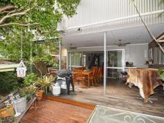 12 Raff Ave Holland Park QLD 4121 $779,000 Plus Buyers Hidden Jewel on Raff Avenue This classic two level character home with contemporary finishes on the border of Holland Park and Greenslopes will impress. The marriage of modern grace and stylish luxury emanates from this massive four bedroom residence. Situated on a generous 685m2 block, this home offers 9 foot ceilings, gleaming polished timber floors, air-conditioning throughout, as well as four large living areas. The gourmet chef's kitchen stylishly finished with granite bench tops, butler's pantry and industrial strength range hood is centrally positioned where double sliding doors open to the rear deck for year-round recreation, hail, rain or shine. Features of your new home * Master bedroom with walk-in robe and air conditioning * En suite to master bedroom with double vanity and extra large shower * 3 additional bedrooms ALL with air-conditioning, * Walk-in robes and study nooks in 2nd and 3rd Bedroom * Two-way modern bathroom between 2nd and 3rd Bedroom * 3rd modern bathroom services the 4th bedroom and family room * Kitchenette with dishwasher and ceramic cook top * Internal laundry with fold-out iron board and heaps of storage Internal staircase to downstairs * Air-conditioned open plan formal lounge and dining * Gourmet kitchen with stainless steel appliances * Gas cook top, dishwasher and granite bench-top * Industrial Stainless Steel extra deep kitchen sink and splashback * Massive butler's pantry with heaps of shelves and storage * Casual dining or sitting area leading to rear deck * 2 x Utility rooms (1 used as an office) * Powder room * 5 meters x 7.5 meters entertaining deck with ceiling fans and surround sound speakers * Fully fenced flat yard * Separate front and side entry to each level of the home * Covered off-street parking for two car and additional space for a small boat or trailer * Remote lock up to car accommodation * Walk to choice of express buses to CBD, Shops, and schools. Look beyond the street facade to discover the many options this home has to offer. Call Marie Garcia on 0416 119 999 to inspect this immaculate property.